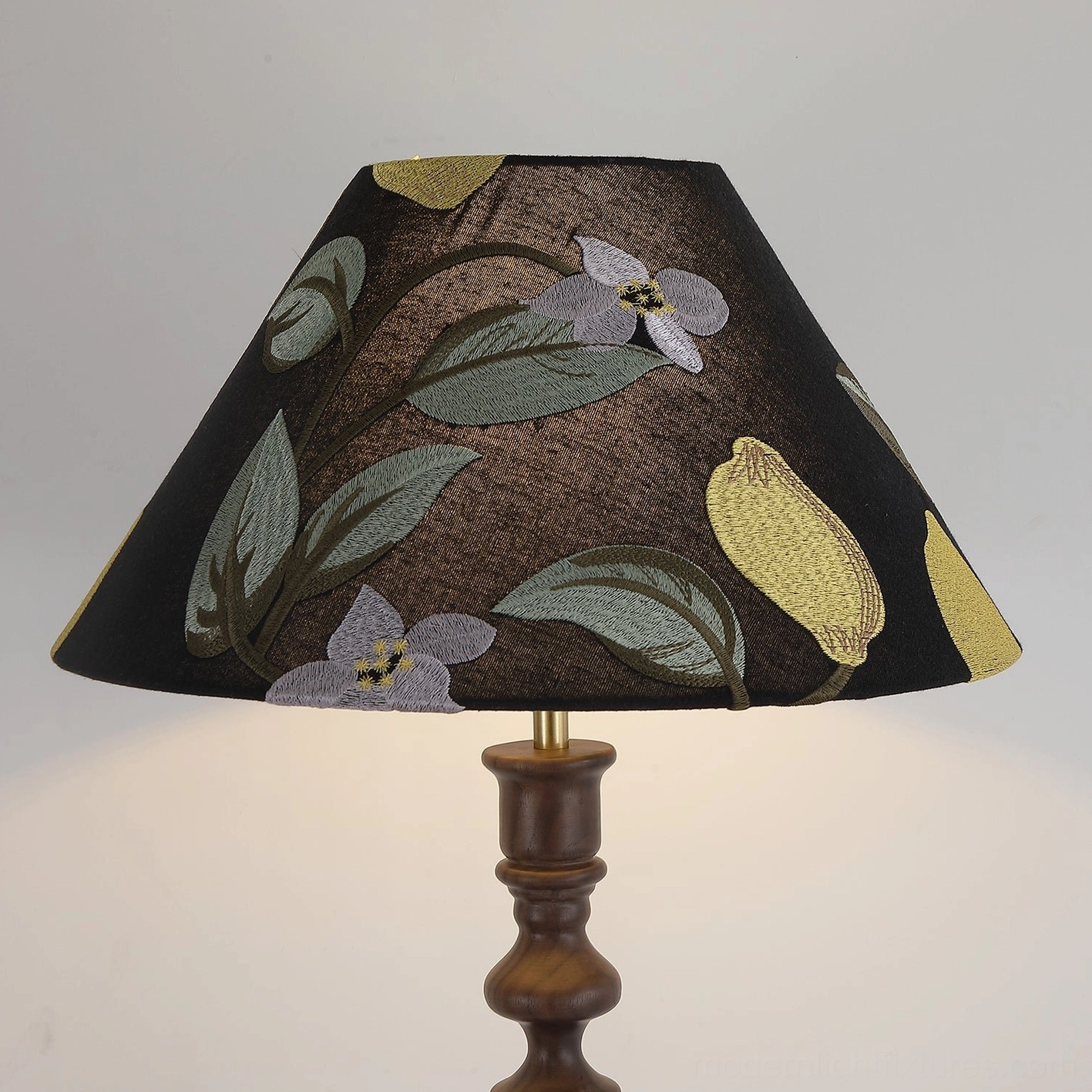 Citrina fabric shade detail with dark brown embroidered botanical pattern