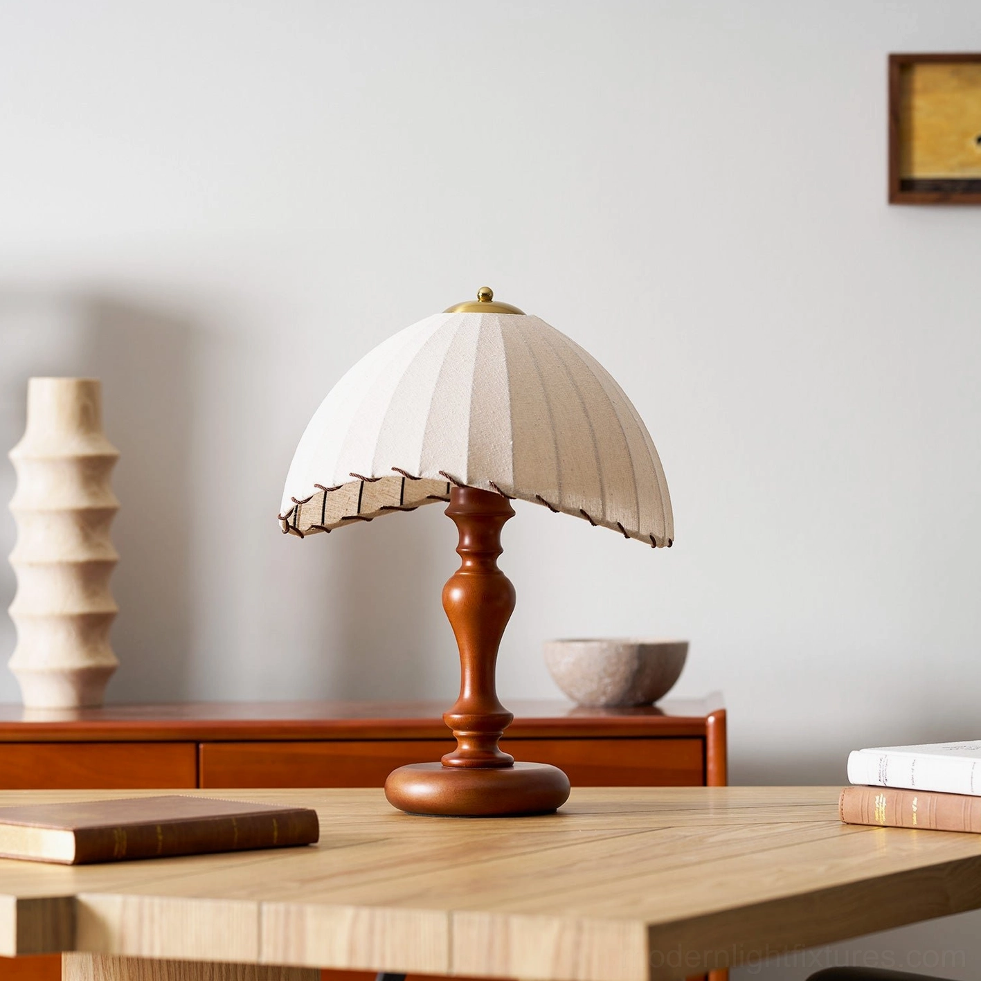 Classic farmhouse style table lamp with turned walnut base and pleated beige shade