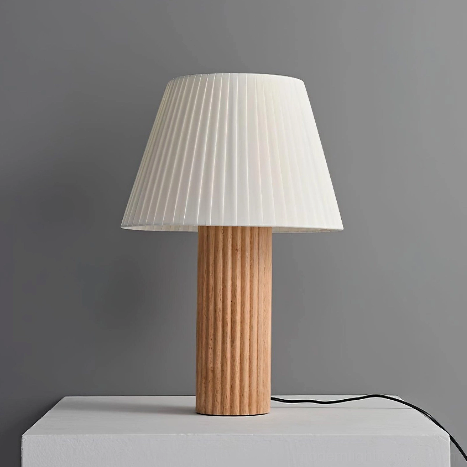 Classic wood ribbed base table lamp with warm pleated fabric shade in timeless design for modern homes seeking elegant functional lighting