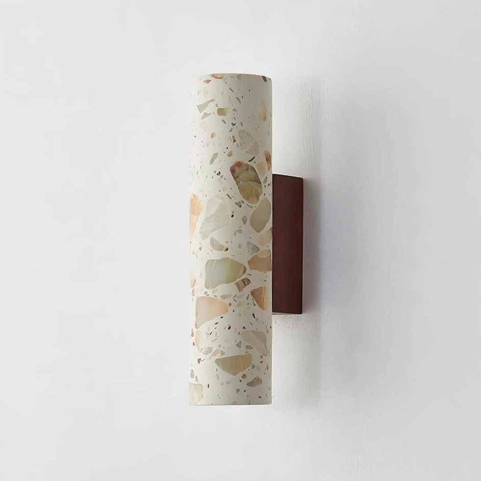 Clasten terrazzo wall sconce in Walnut Color and Beige finish showing natural stone variation