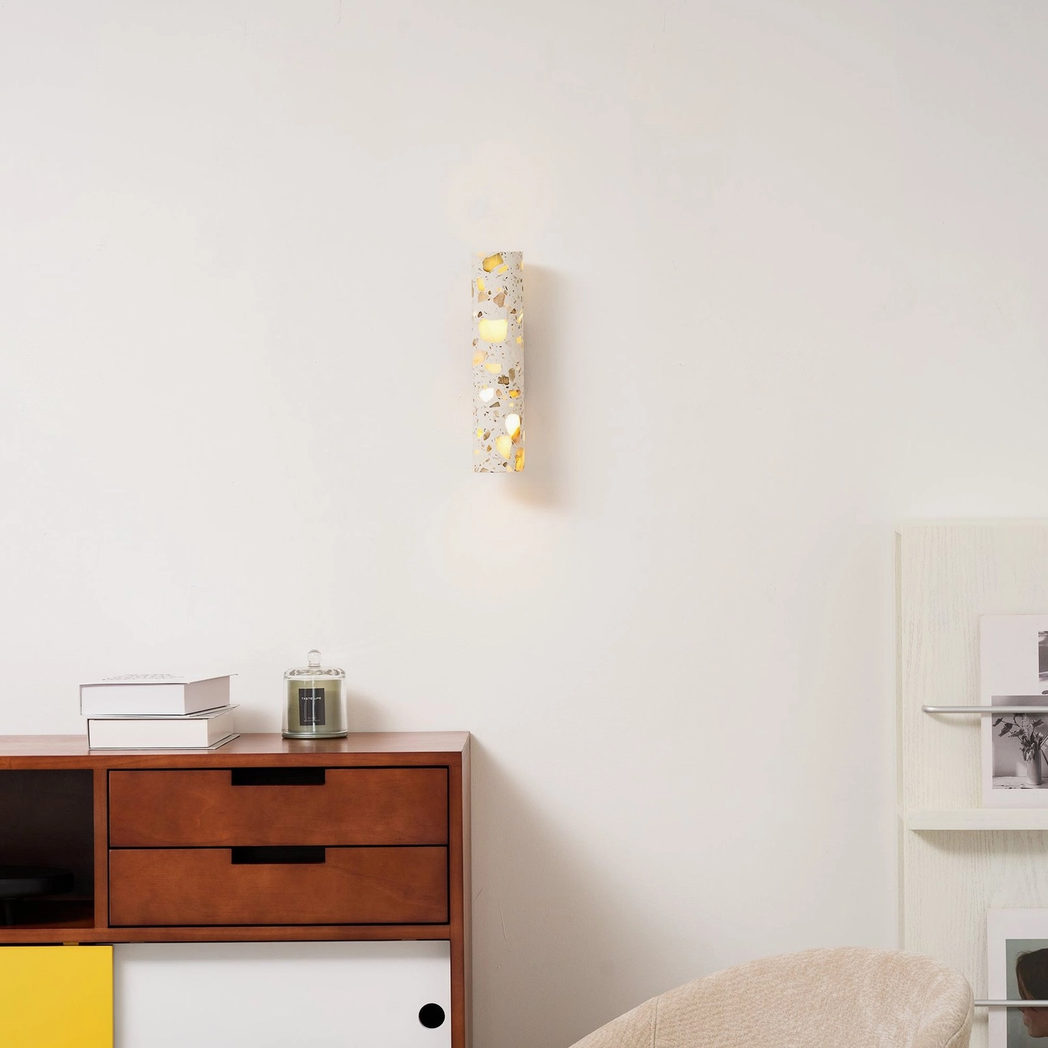 Modern terrazzo wall sconce in bathroom or damp-rated covered outdoor area installation