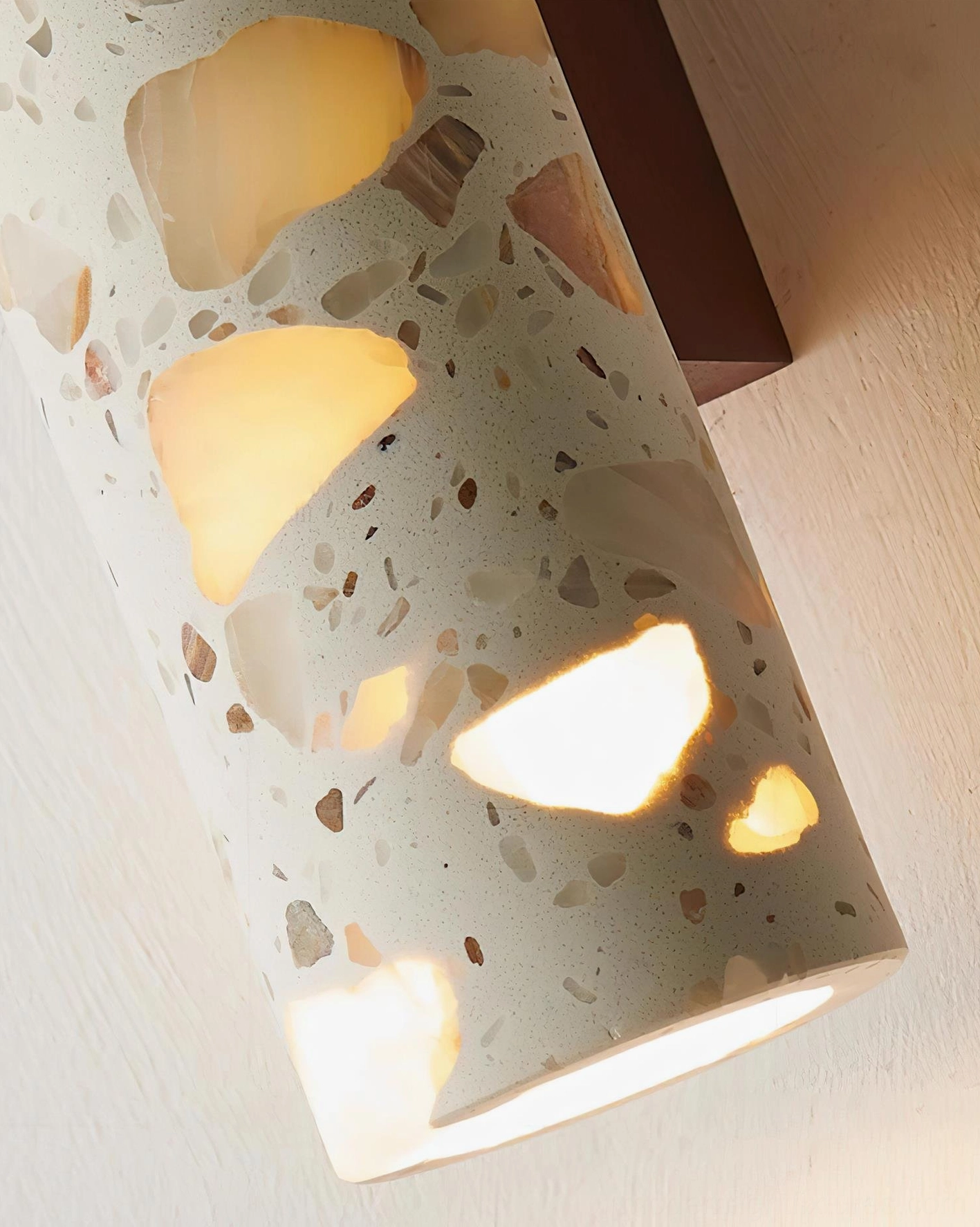 Contemporary terrazzo wall lamp showing architectural form and sculptural presence in modern interior