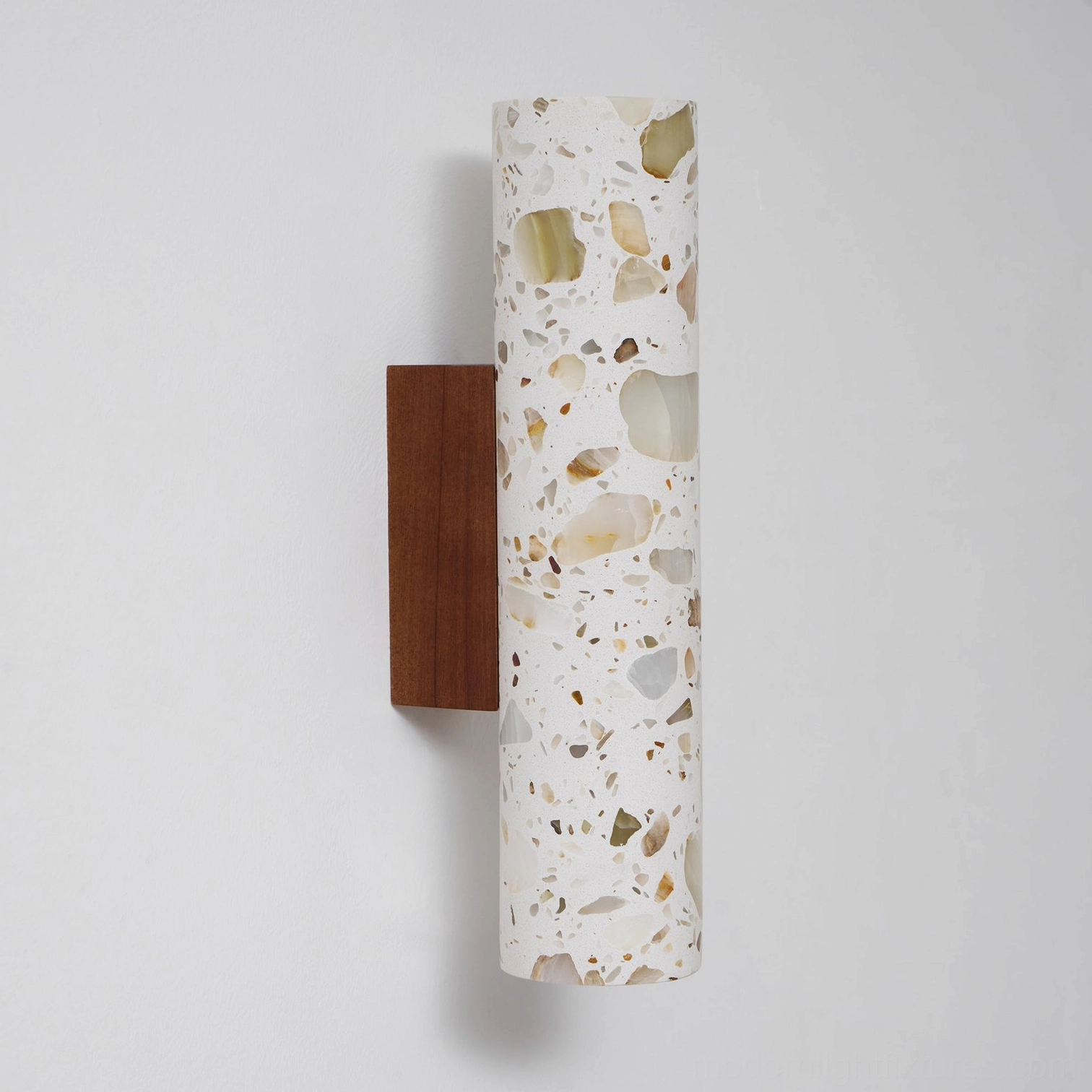 Modern terrazzo wall sconce mounted installation detail showing G9 socket and hardwired connection