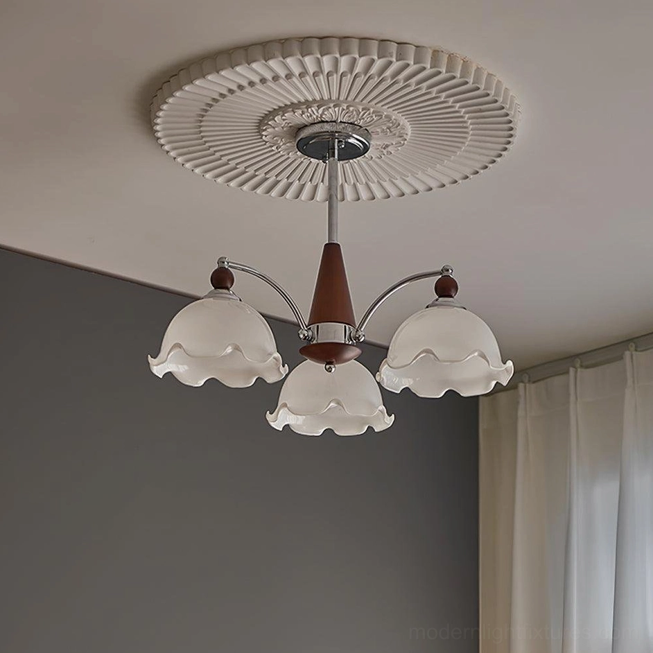 Claudia Floral Glass Chandelier chrome metal rod walnut wood hub brown glowing shades front view
