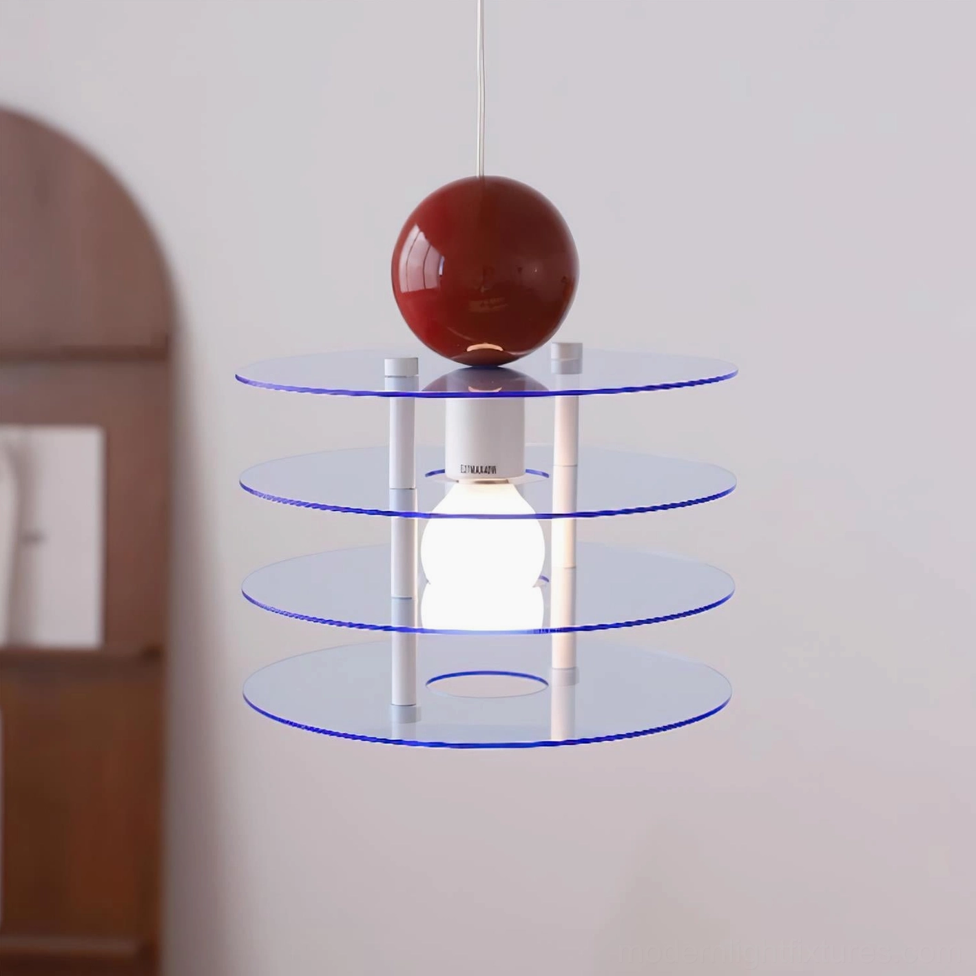 Clear blue stacked acrylic pendant lamp with dark red sphere finial