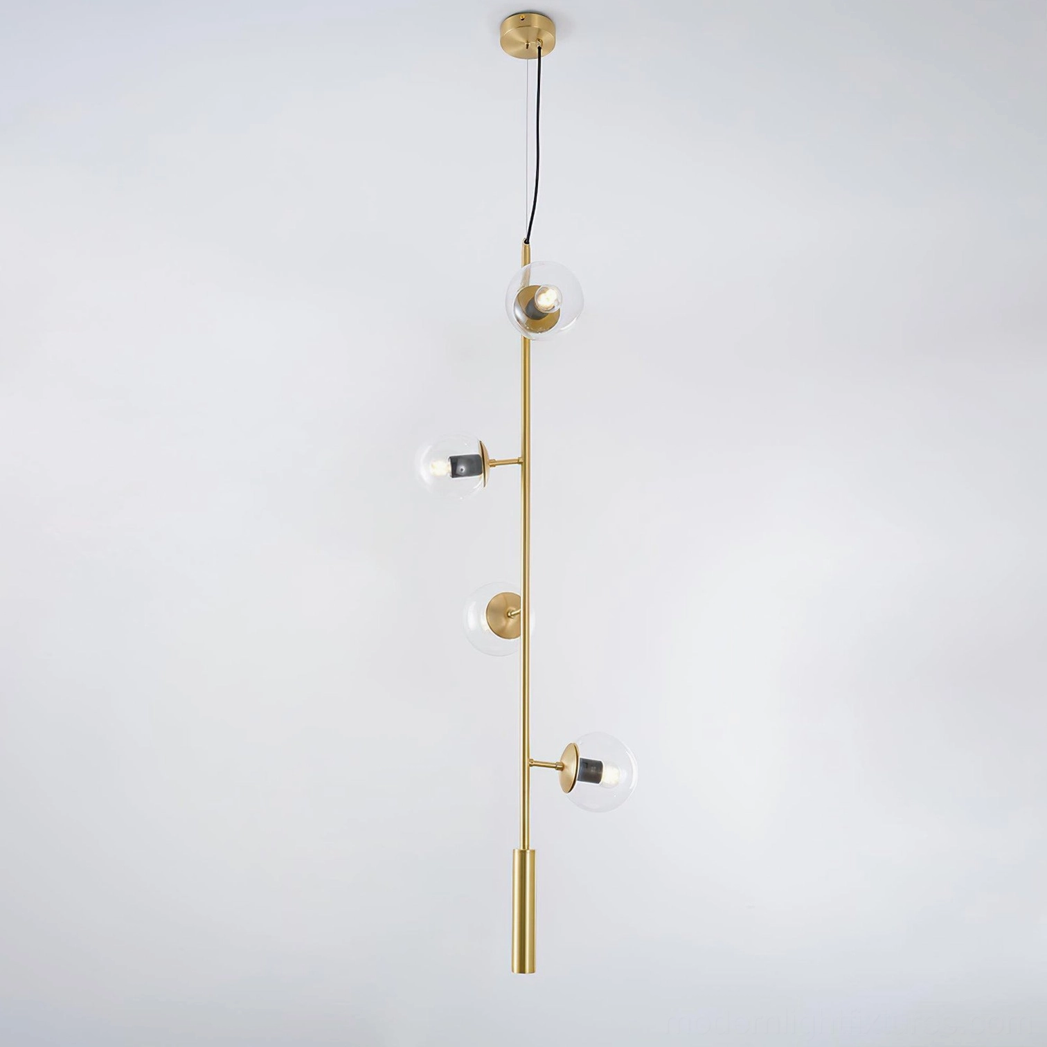 Contemporary pendant orb chandelier with clear glass orbs and polished brass hardware