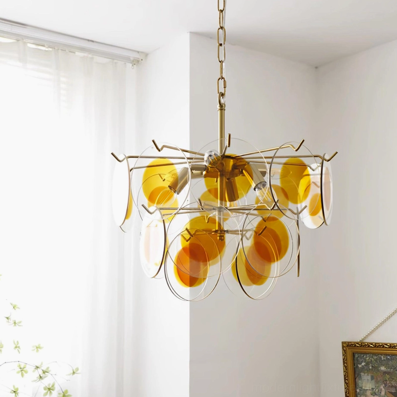 Clear and caramel glass disc chandelier brass frame dining room lighting mid-century modern style