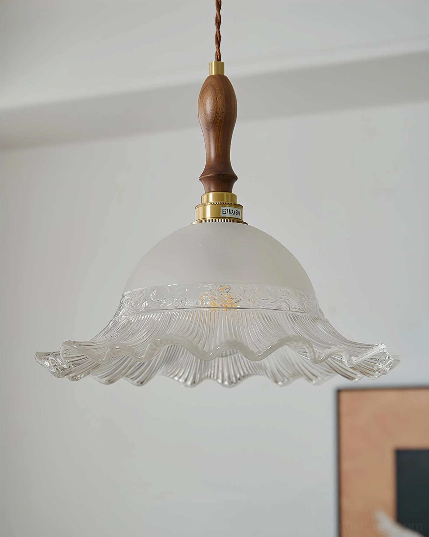 Clear hand-blown frosted glass pendant light with textured embossed pattern and walnut wood fixture