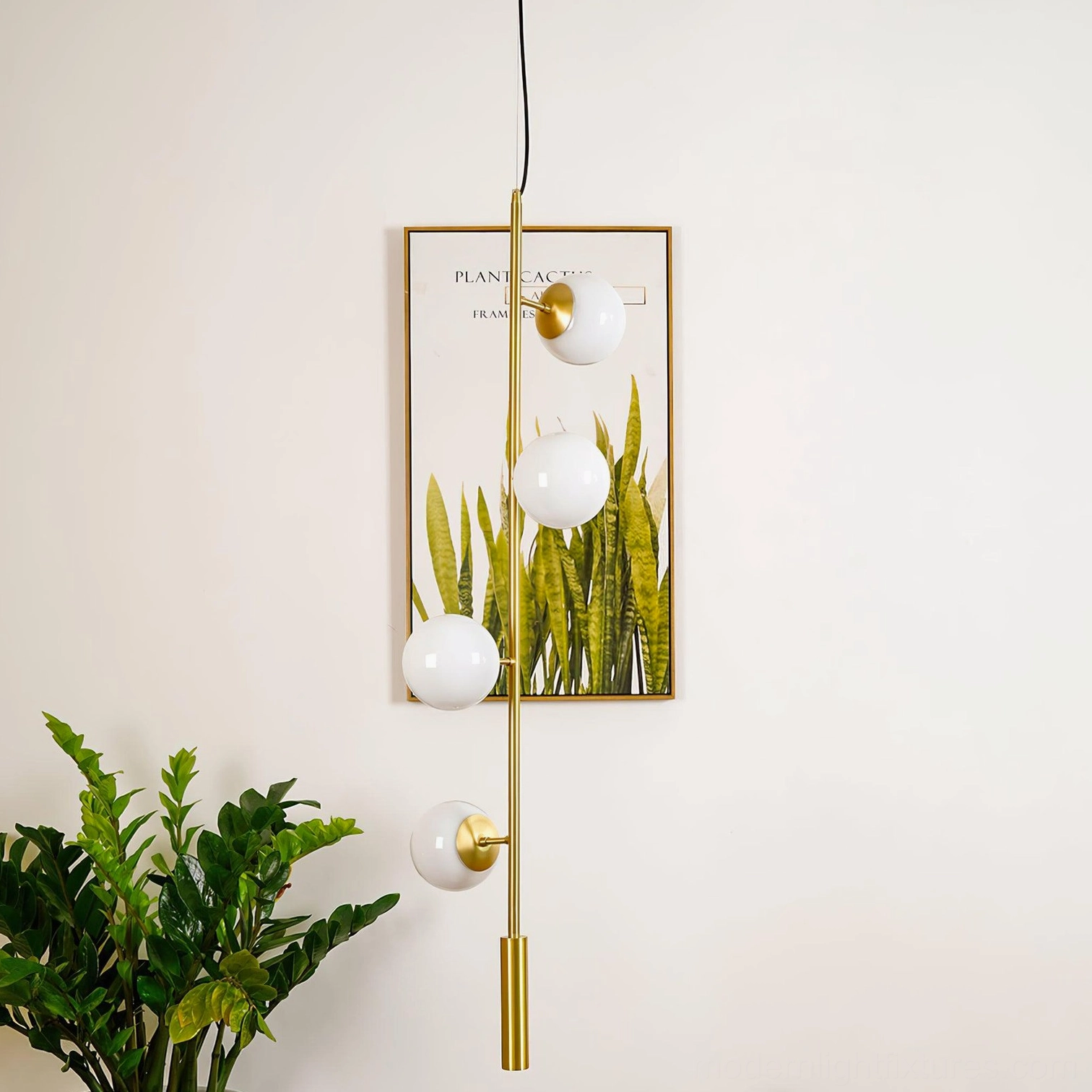 Clear glass orb chandelier with visible internal structure and brass suspension system