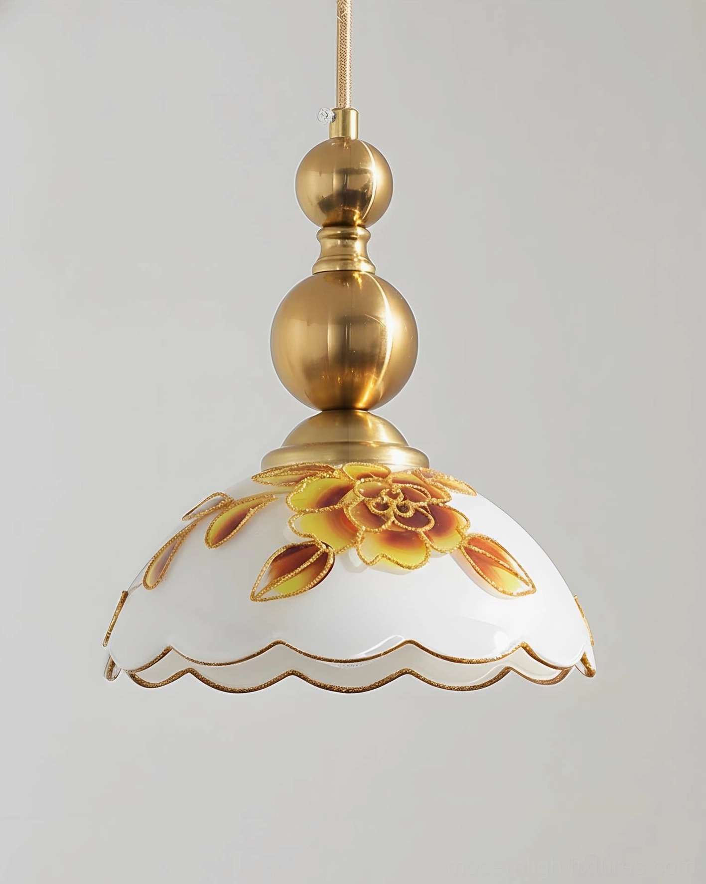 Close-up detail of hand-painted floral design on pendant light shade with scalloped rim