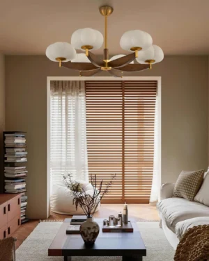 Cloud pendant chandelier installed in vintage living room with wooden window blinds, warm ambient lighting in residential interior