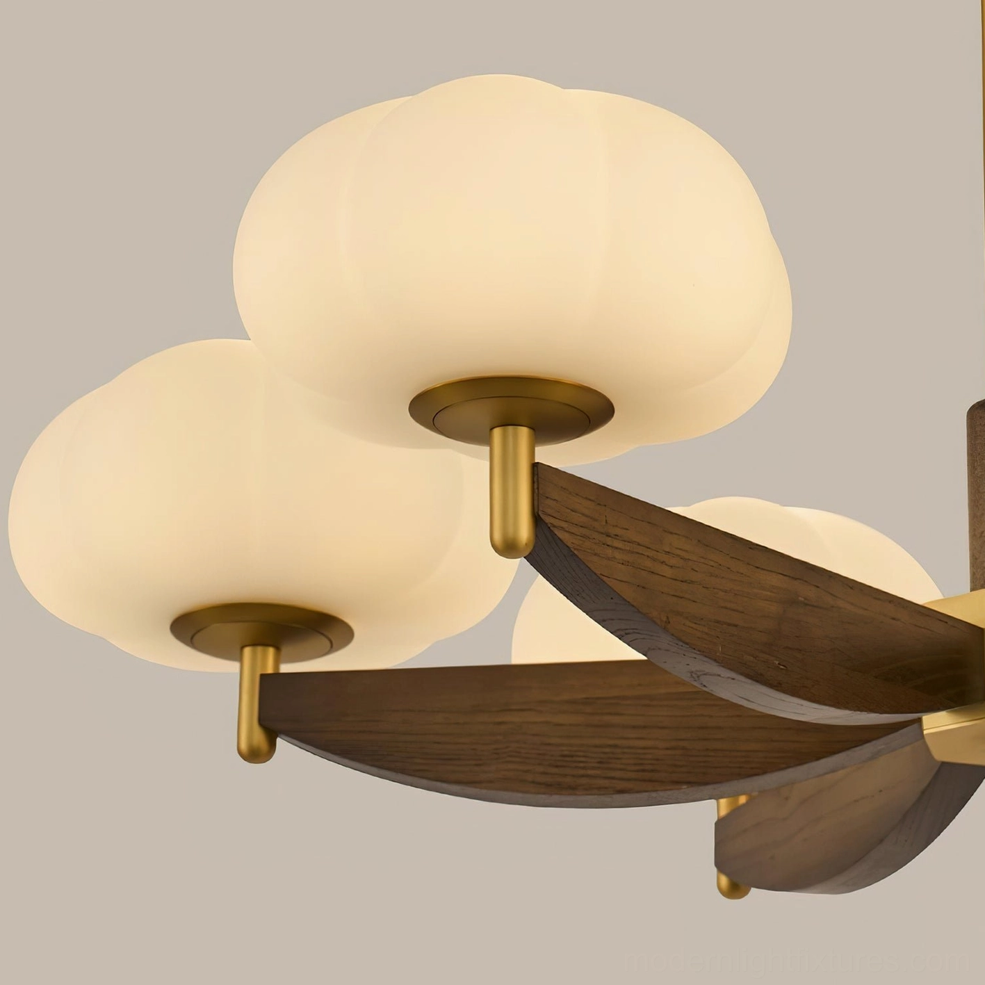 Modern cloud glass pendant chandelier close-up showing frosted opal glass shades and metal framework details