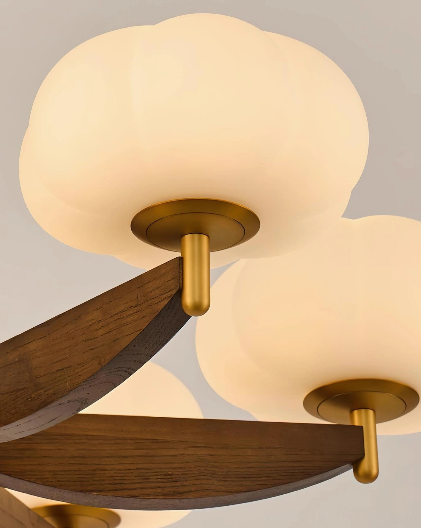 Modern cloud glass pendant chandelier multiple angle view showing sculptural wooden arms and glass shade arrangement