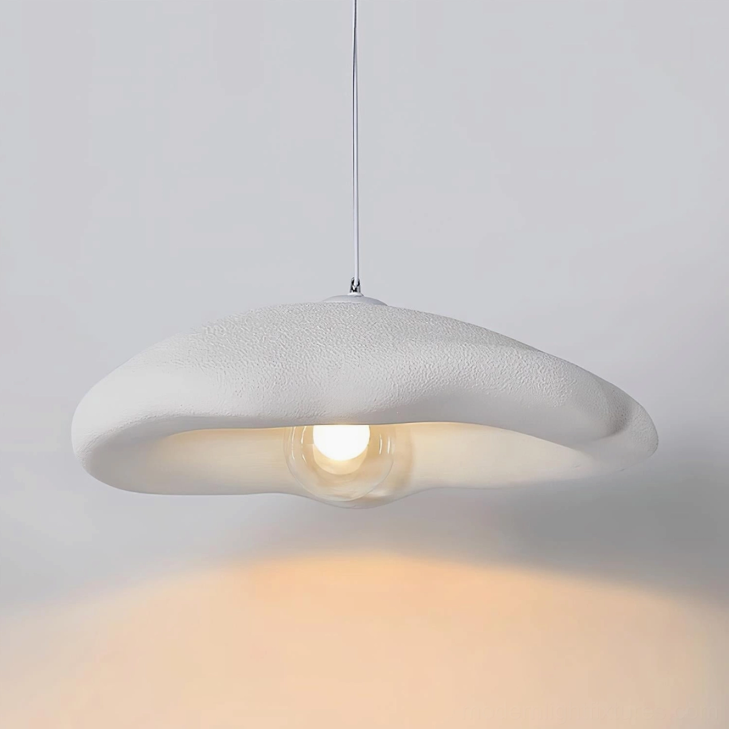 Cloud pendant light close-up - polystyrene matte finish with textured organic surface detail