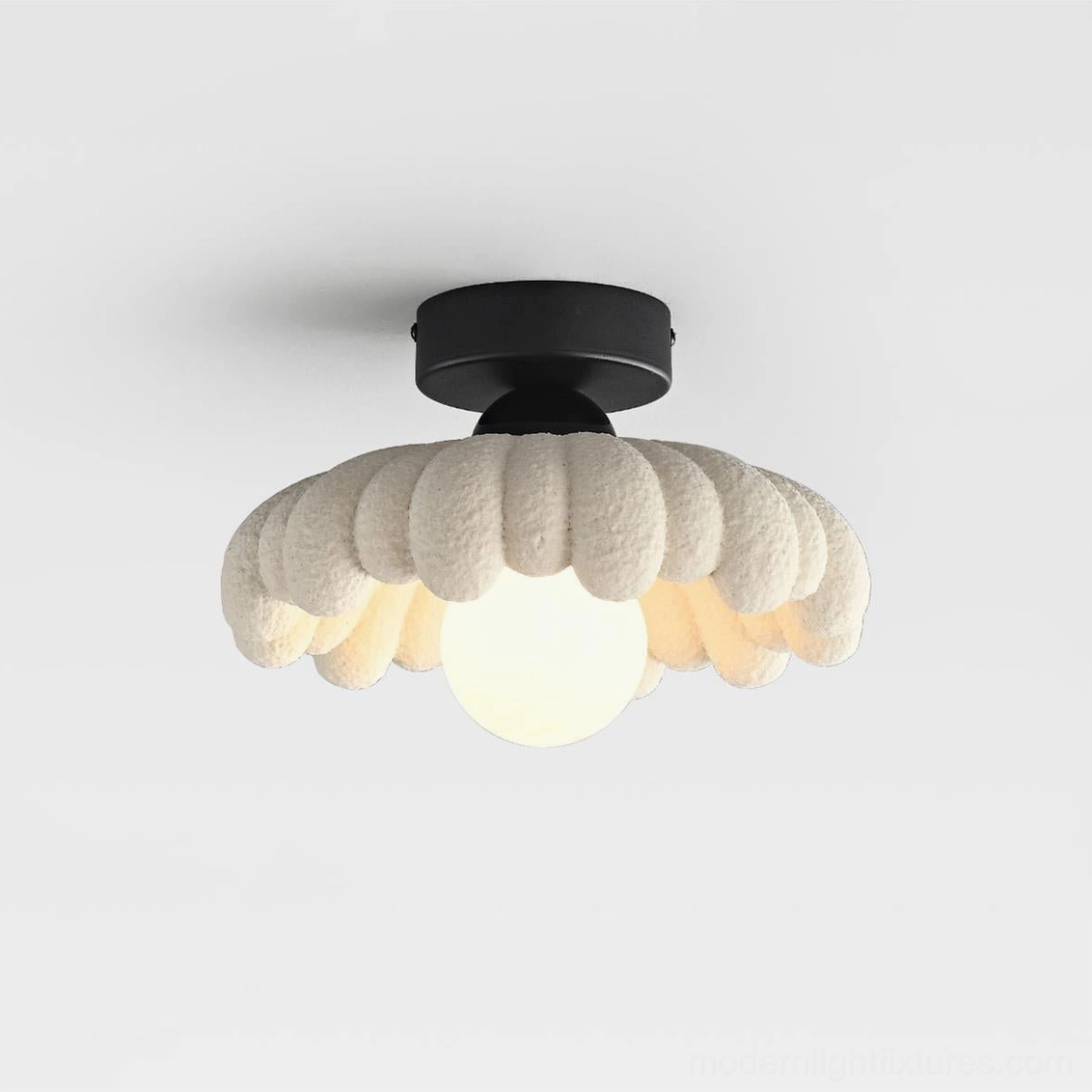 Cloud Petal Ceiling Light Fixture with illuminated center bulb and simple black ceiling base mounting