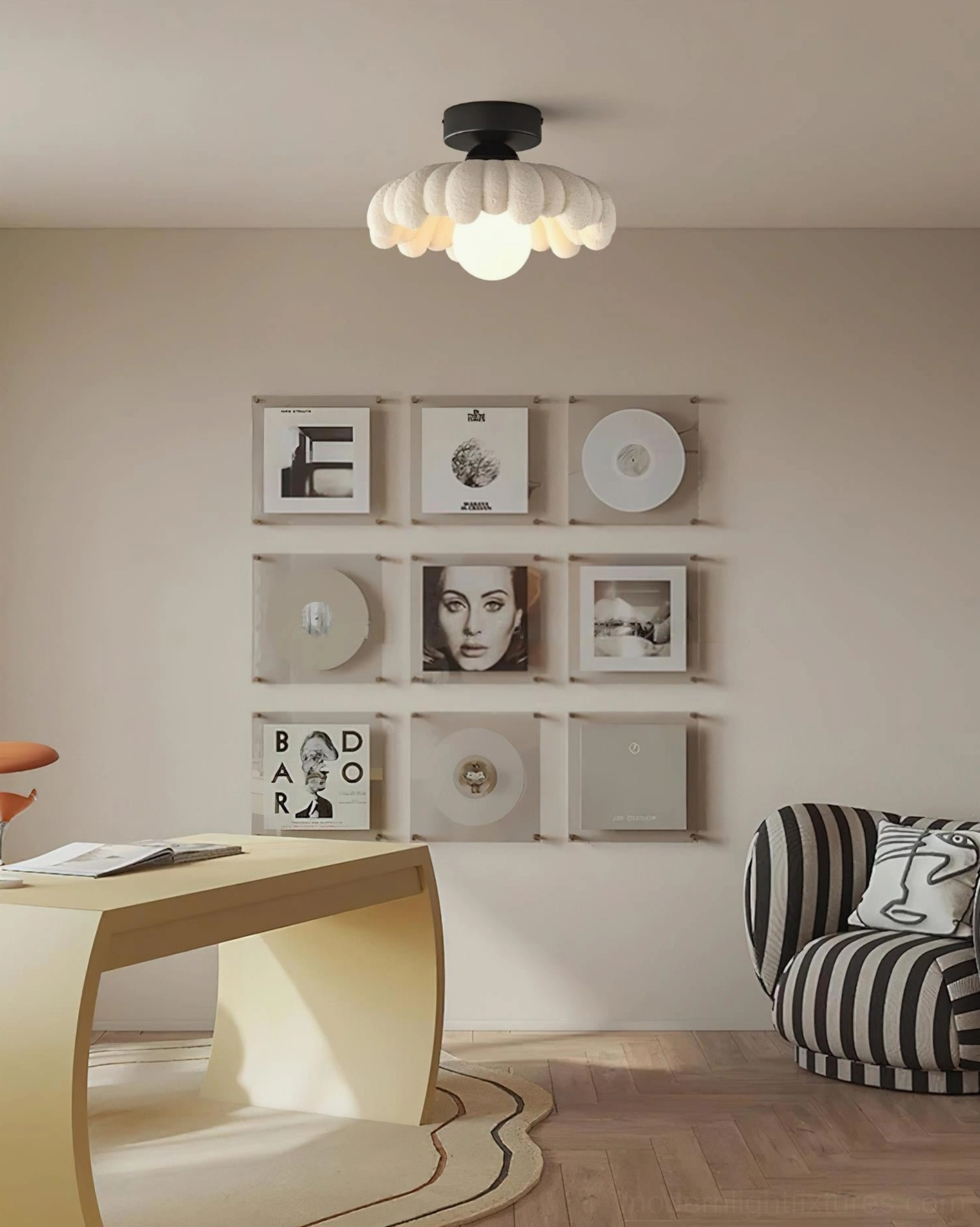 Cloud Petal Ceiling Light Fixture illuminated in contemporary living room with striped sofa and minimalist Nordic style