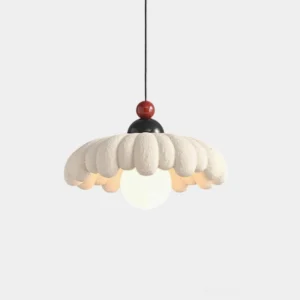 Cloudet sculptural pendant lamp with scalloped white fabric shade and decorative metal top, front view on plain background