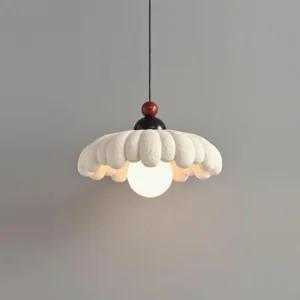 Modern pendant light with illuminated bulb glowing beneath cloudet's textured organic shade, ambient lighting detail