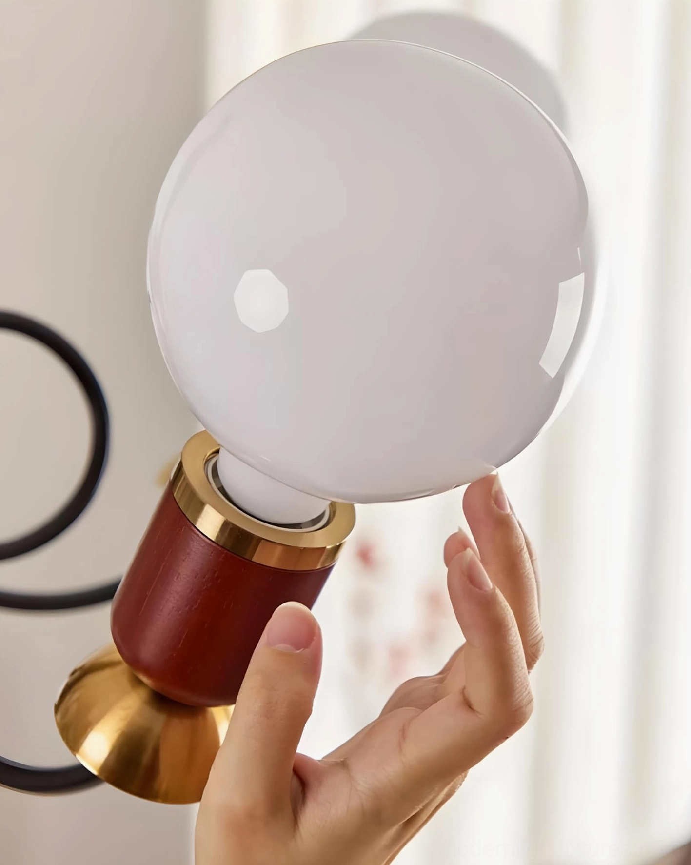 Frosted glass cluster chandelier showing light distribution and mid-century aesthetic