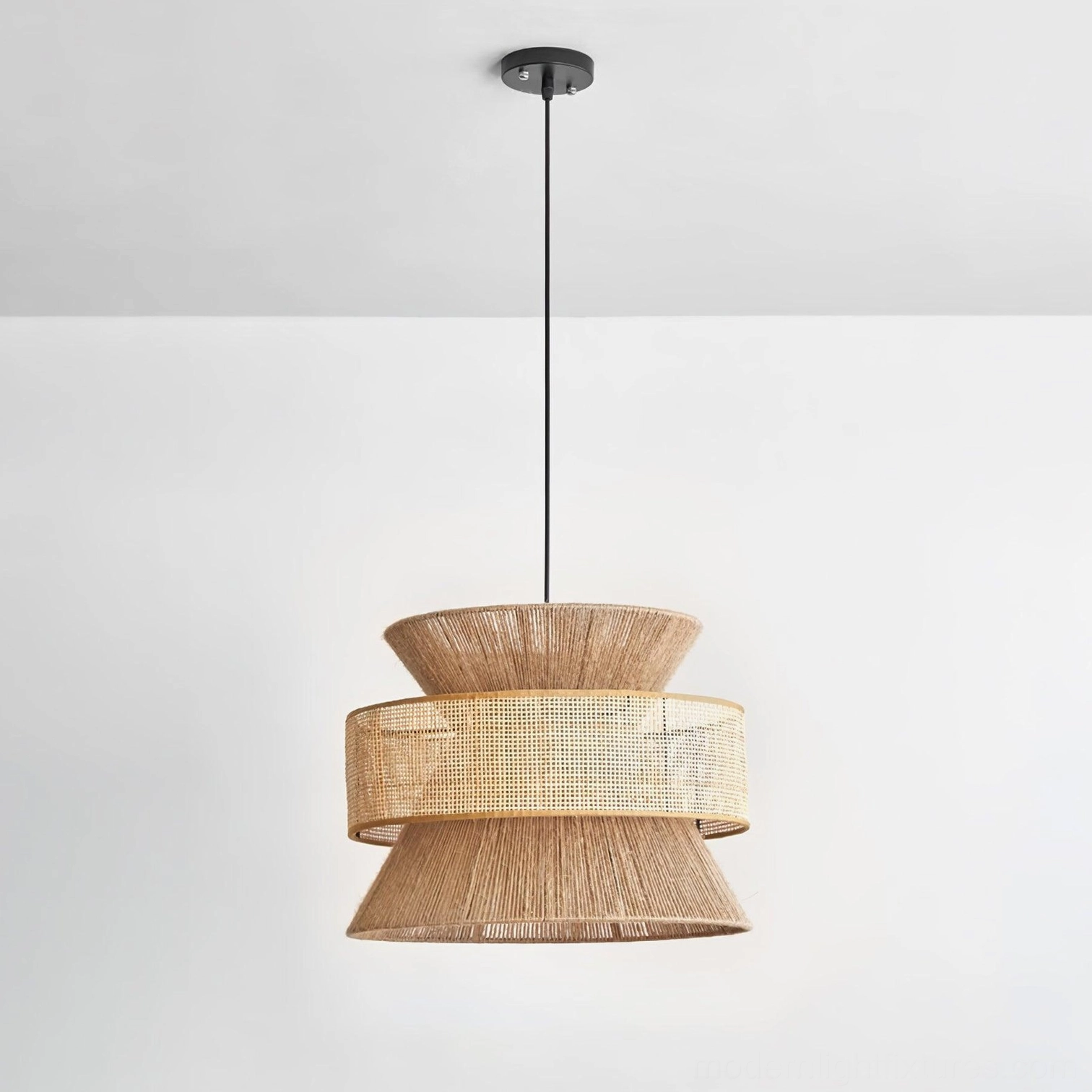 Multiple rattan pendant lights clustered together in dining space for layered bohemian ambiance