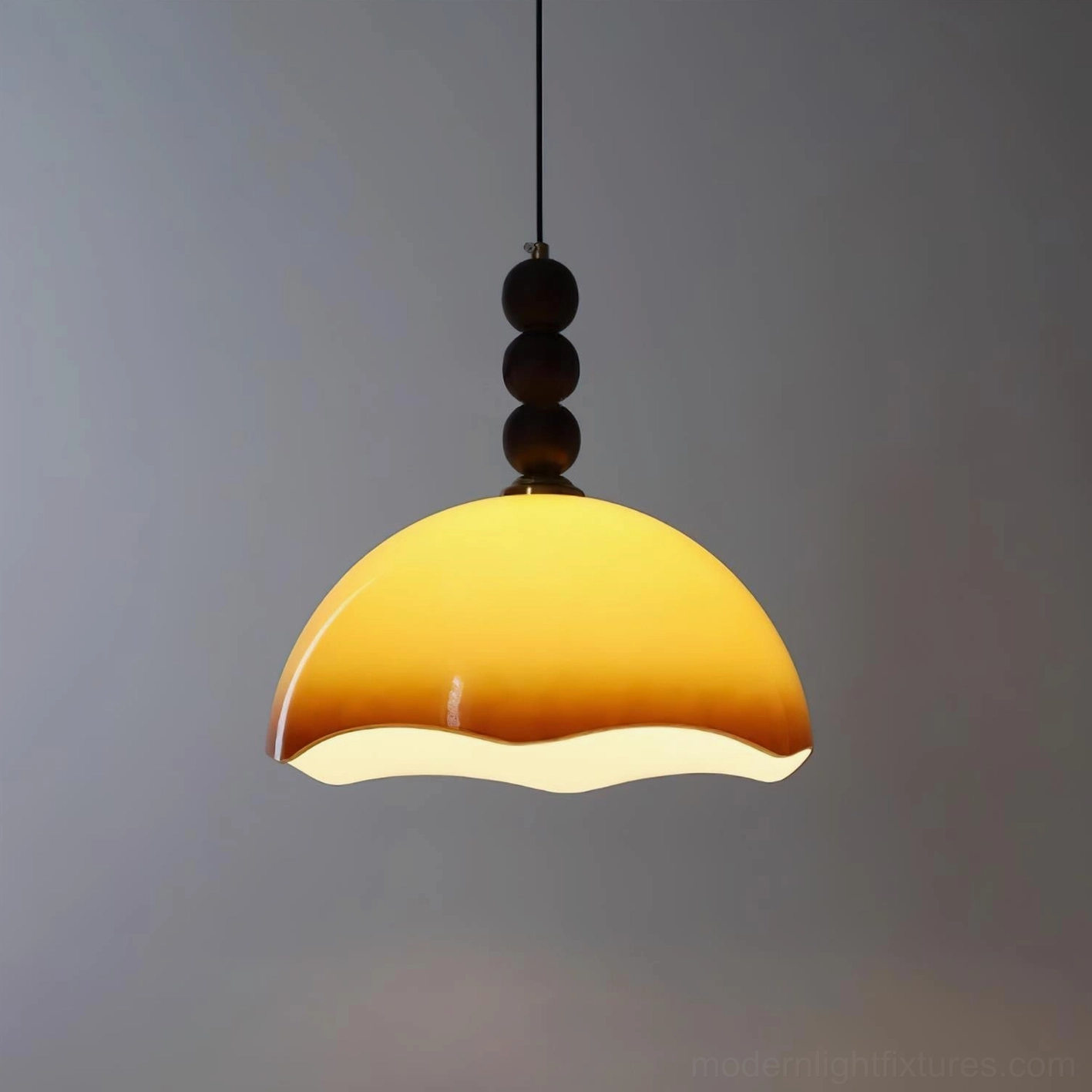 Multiple rippled glass pendant lights clustered at varying heights creating dramatic focal point in contemporary dining space