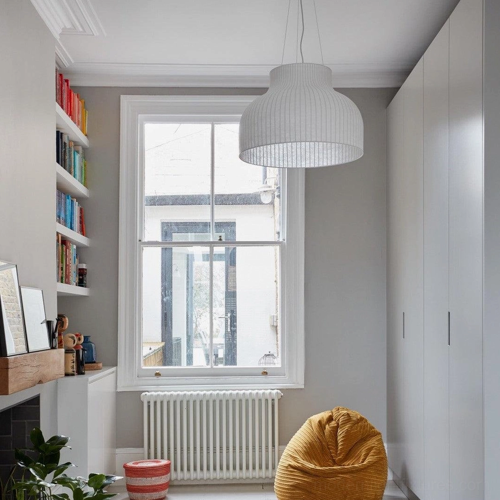 White cocoon pendant light showing diffused lighting performance and fabric structure detail