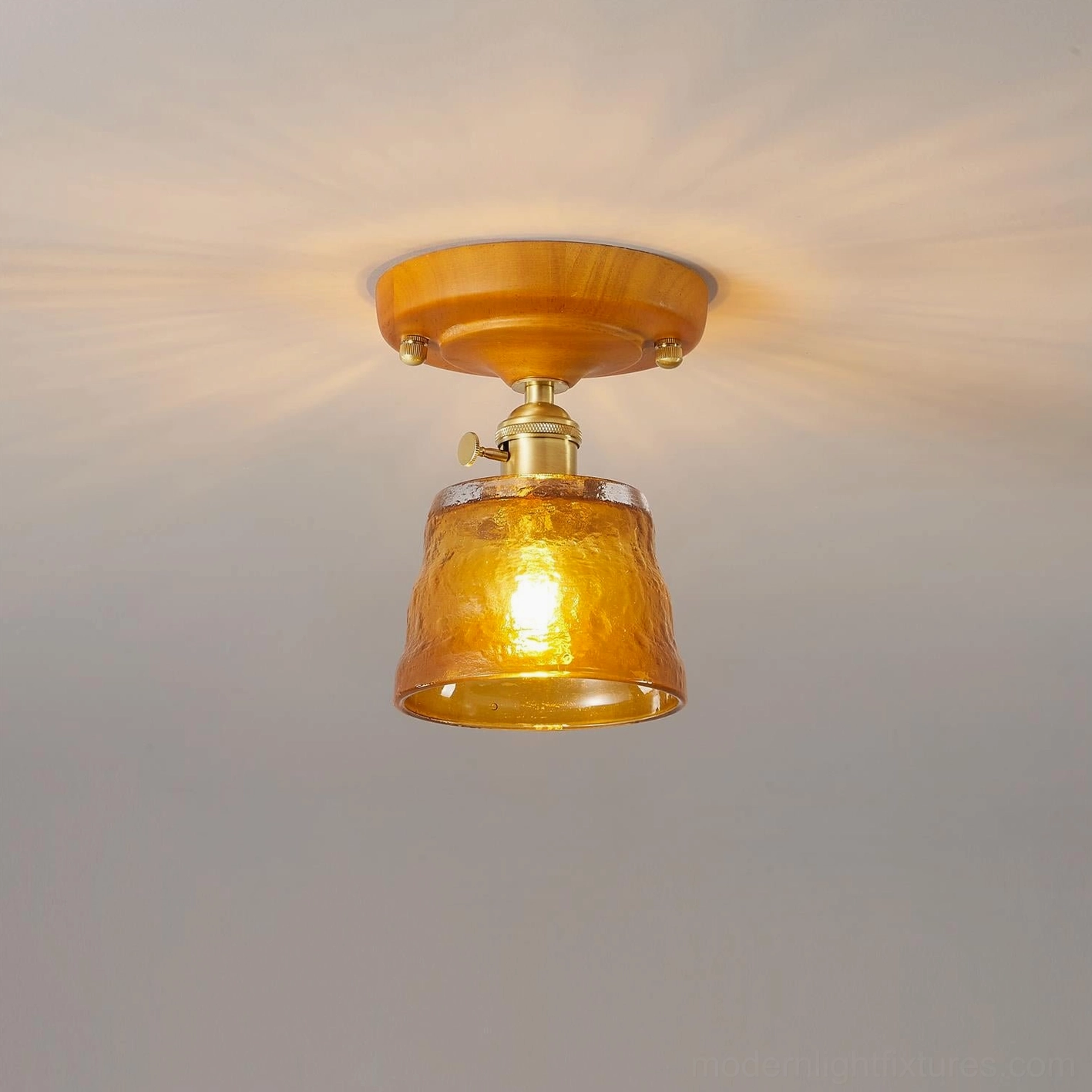 Cognac vintage glass ceiling fixture warm lighting glow installation detail