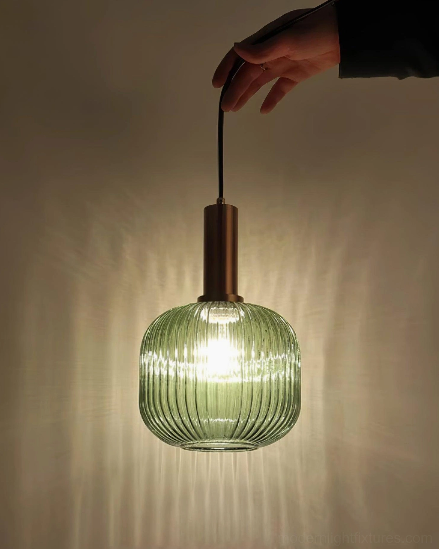 Cognac ribbed glass pendant lamp individual fixture showing warm amber tone and ribbed glass architectural design
