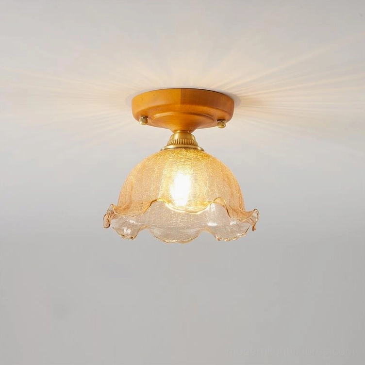 Cognac ruffled glass ceiling light fixture with warm ambient lighting effect, showcasing rich color depth