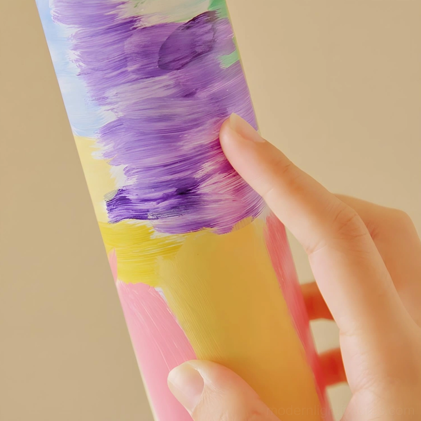 Colorbeam floor lamp body section close-up with hand touching painted surface, showing thick brushstroke art texture and craftsmanship