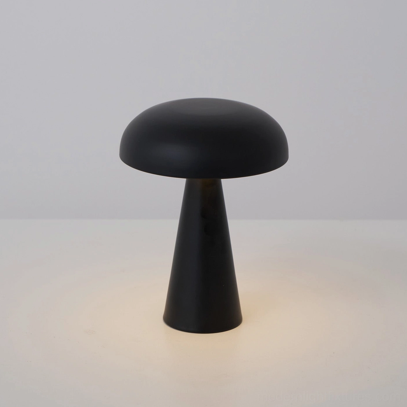 Como black aluminum cordless table lamp matte finish high-contrast dramatic modern design