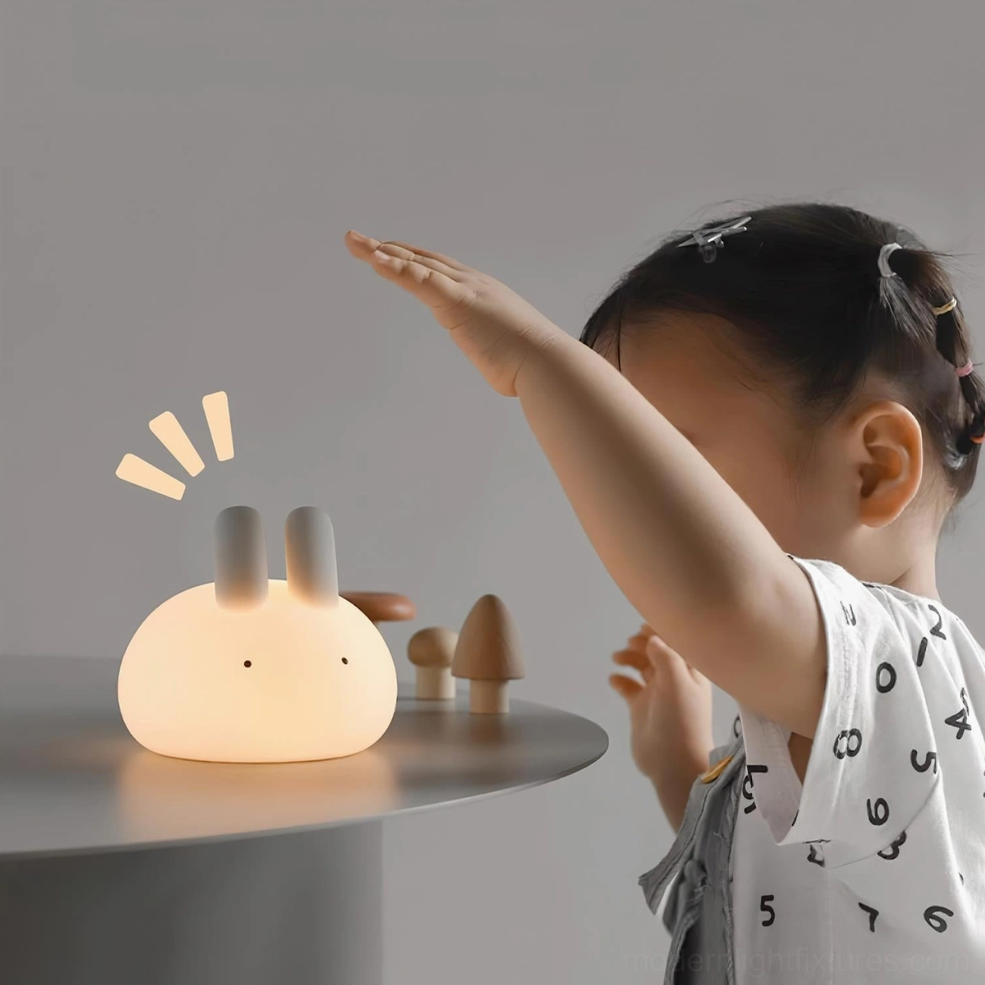 Compact 11cm bunny night light fitting perfectly on bedroom nightstand shelf