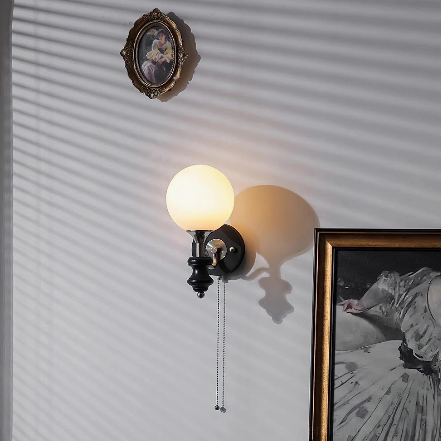 Compact frosted glass globe wall sconce in vintage home décor setting