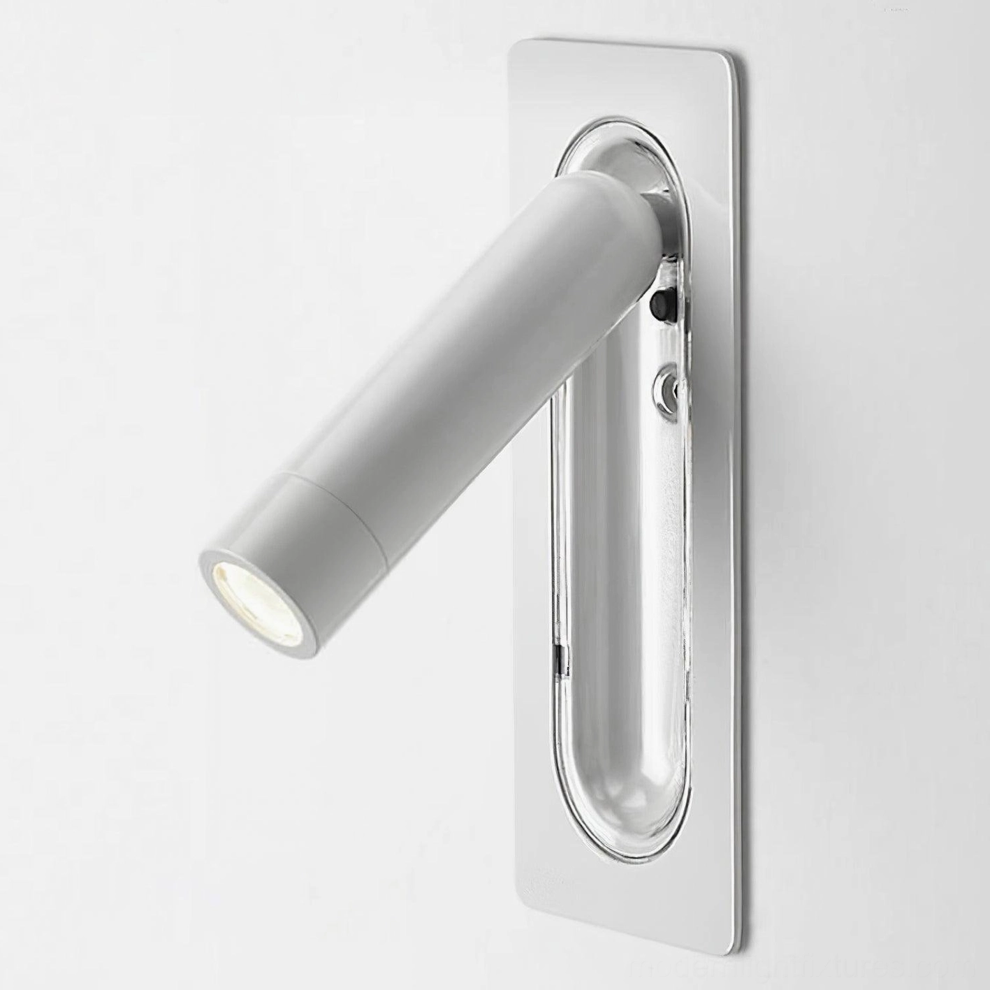 Bedroom lighting solution showing compact recessed wall lamp maintaining clean aesthetic while providing focused task light