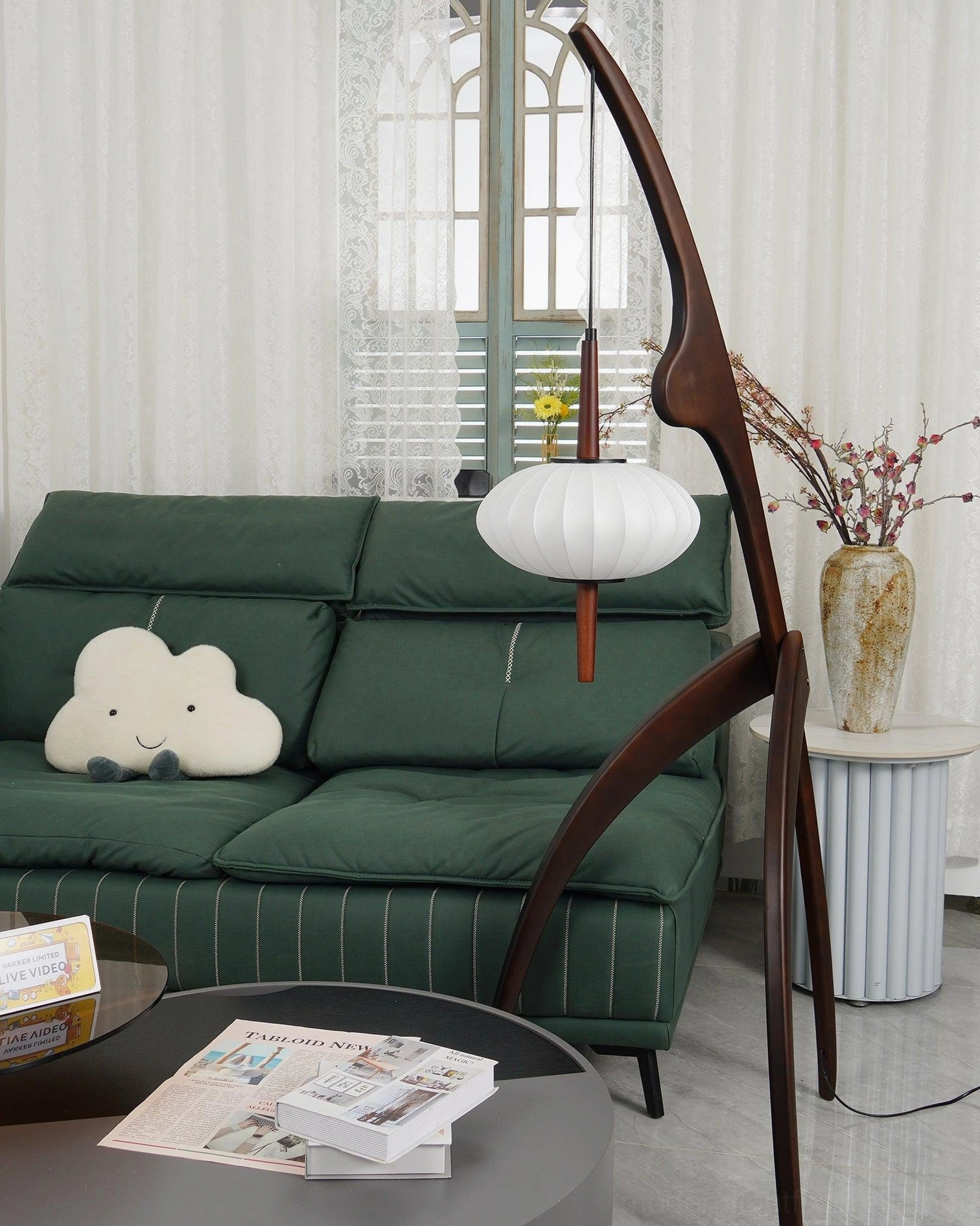 Contemporary arc floor lamp wooden construction fabric shade interior design lighting