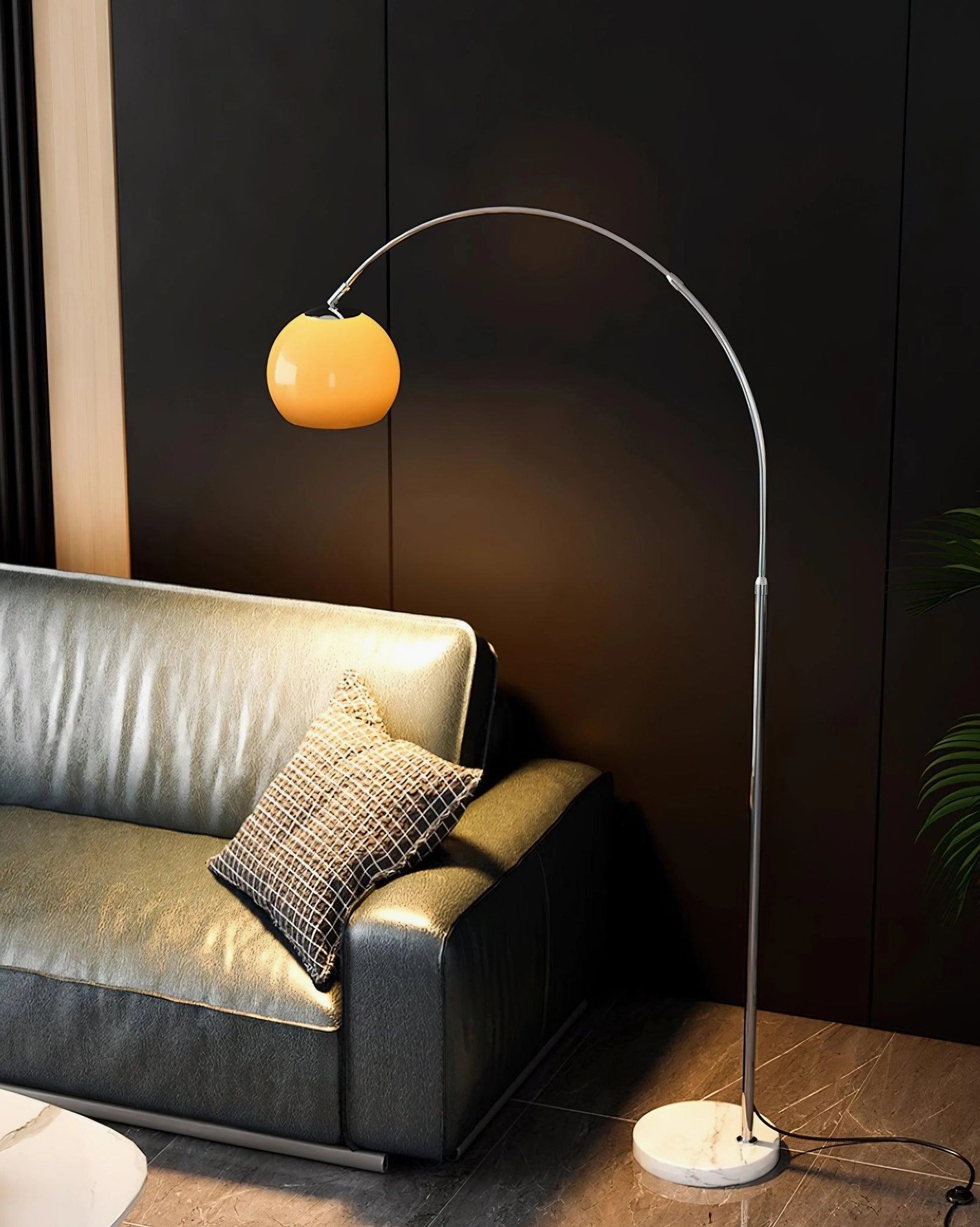 Contemporary arc floor lamp orange variant with chrome arched frame installation