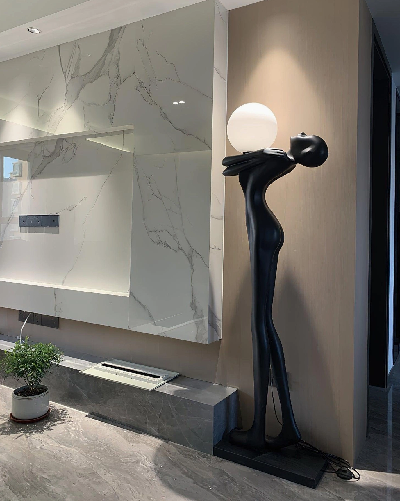 Contemporary sculpture floor lamp artistic lighting, black matte resin human silhouette, modern home decor