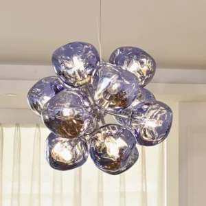 Contemporary glass bubble pendant lamp with smoky purple orbs and chrome base in minimalist living room
