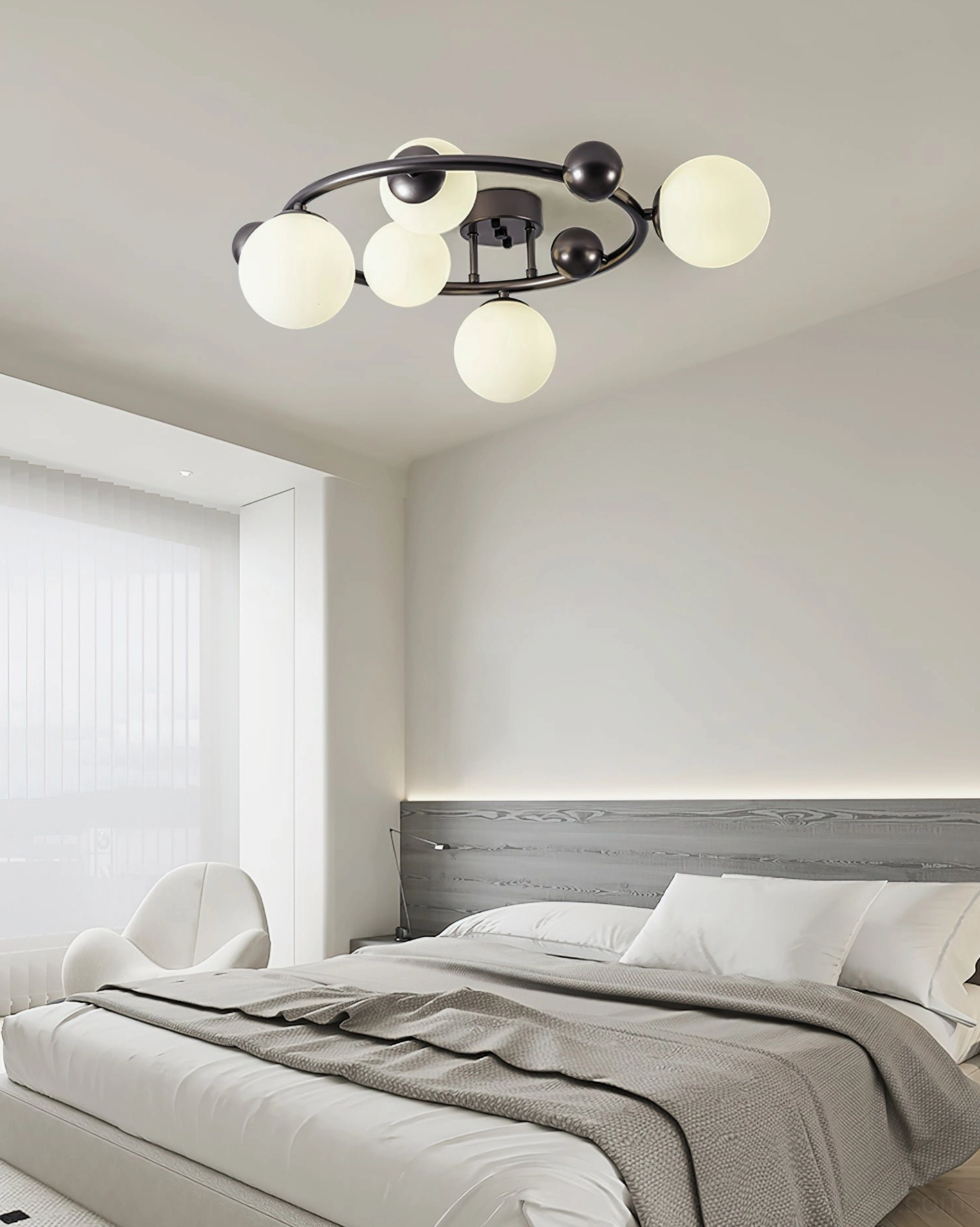 Contemporary 5-globe ceiling light fixture in black metal mounted in modern bedroom above wood headboard