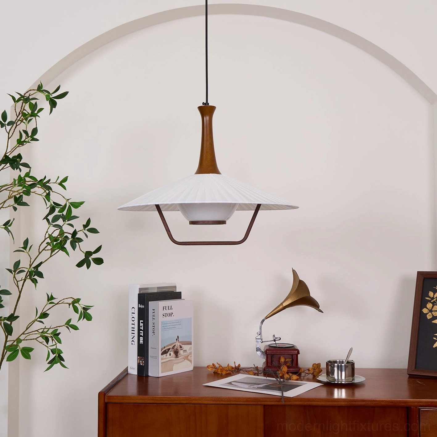 Contemporary ceiling pendant lamp installed interior design space warm cozy ambiance