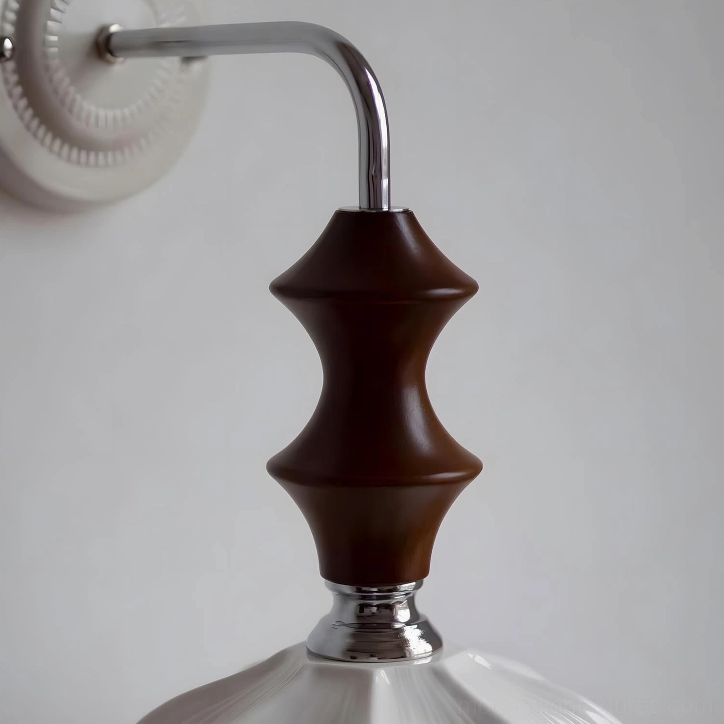 Contemporary ceramic wall sconce fixture mounted in stylish interior design setting ambient light