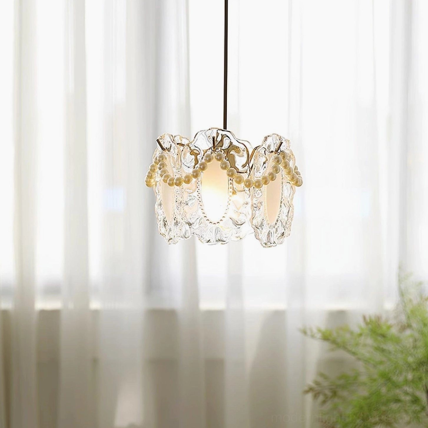 Contemporary crystal petal pendant light creating statement focal point in modern living room interior design