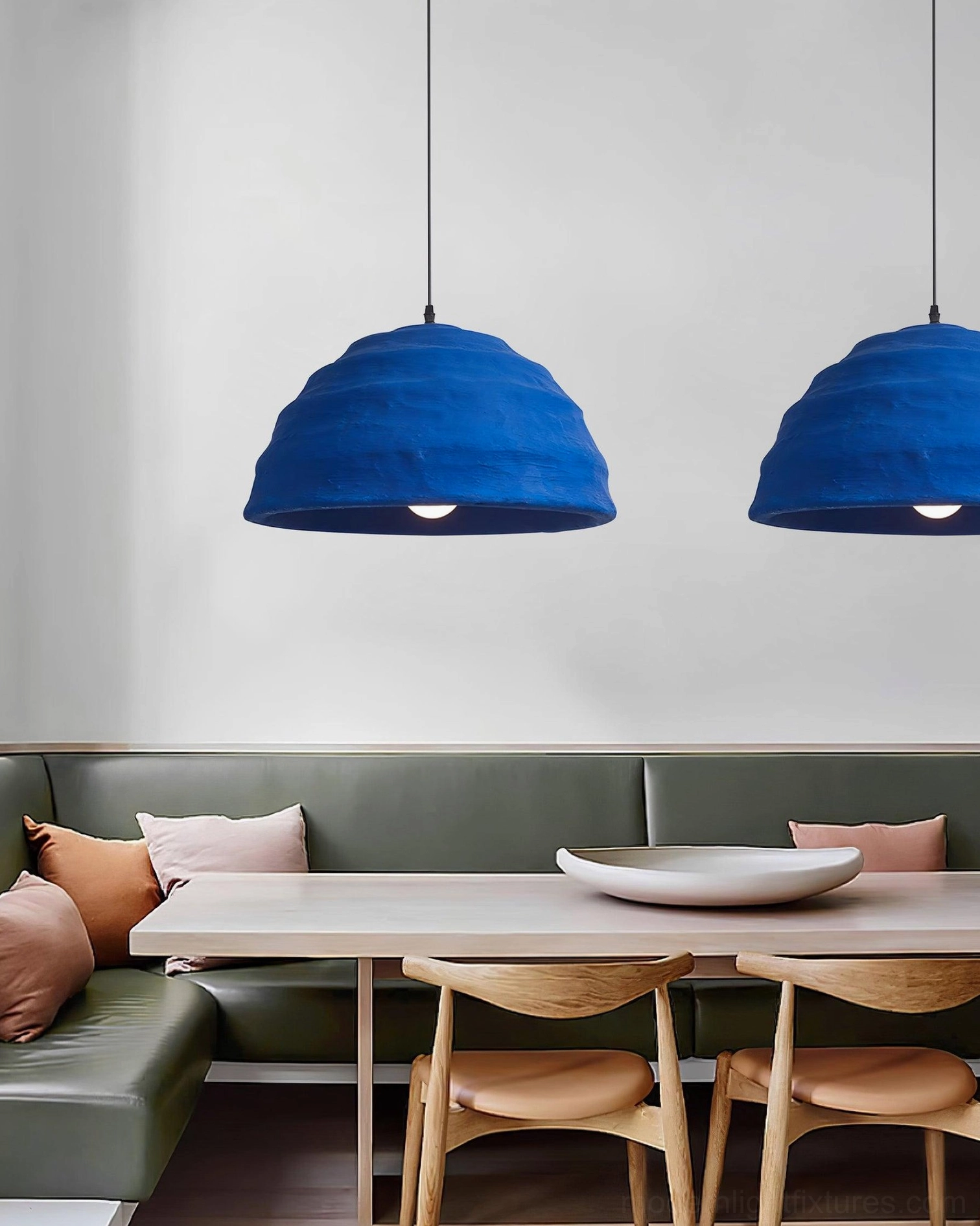 Contemporary dome pendant light in styled interior demonstrating design compatibility with decor