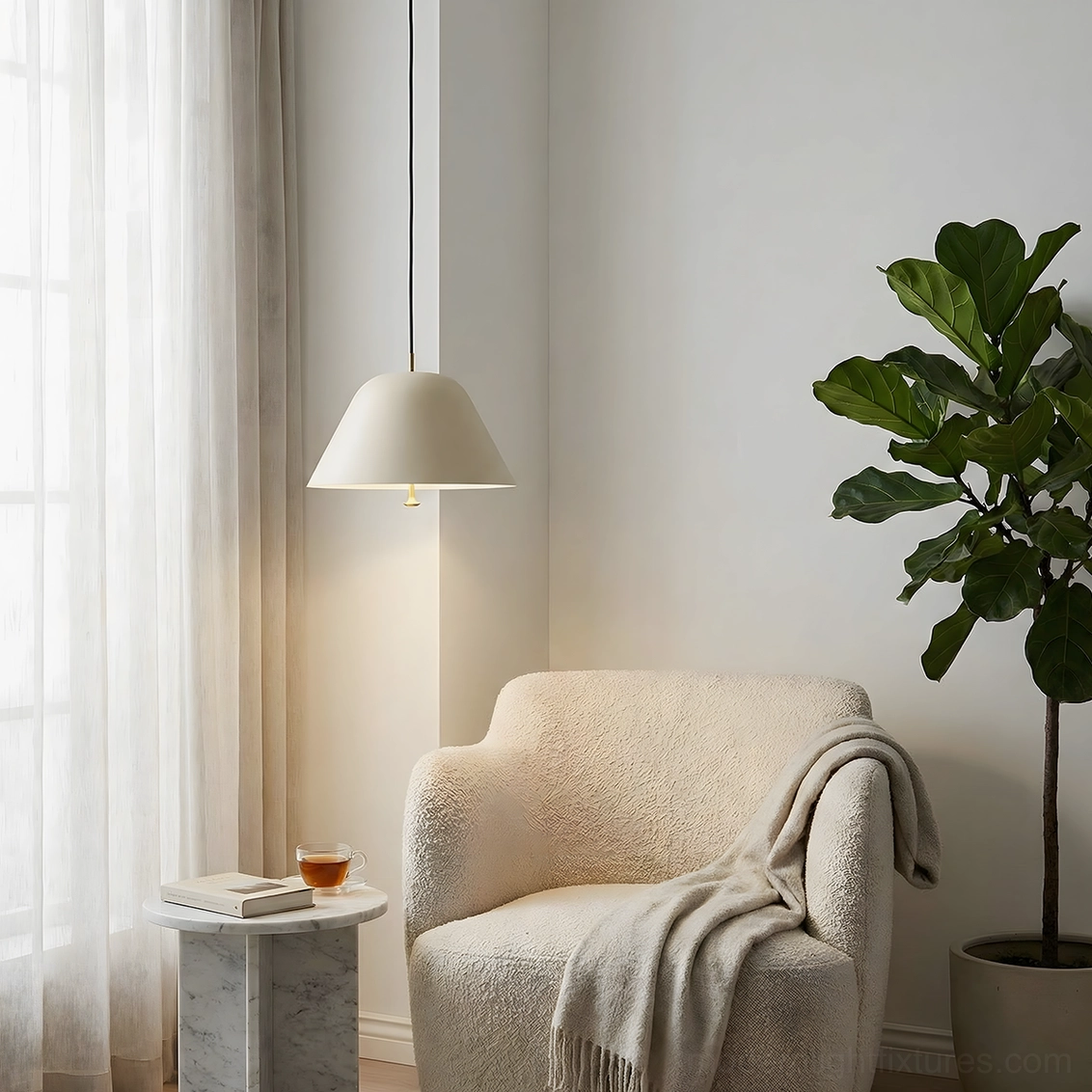 Contemporary dome pendant light in neutral interior creating warm focused illumination above dining area