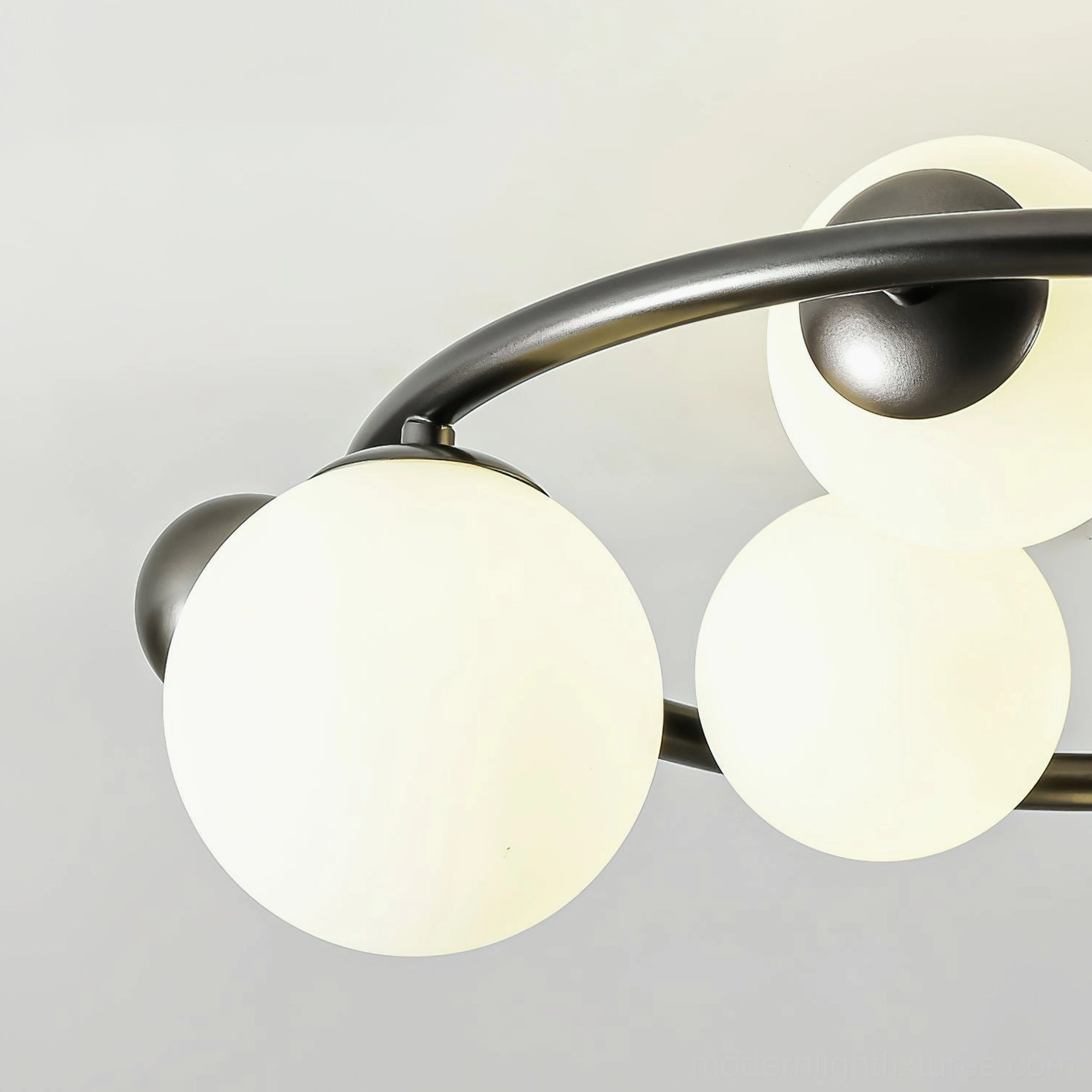 Contemporary 5-globe flush mount ceiling light - installed view showcasing modern sculptural design and ambient illumination