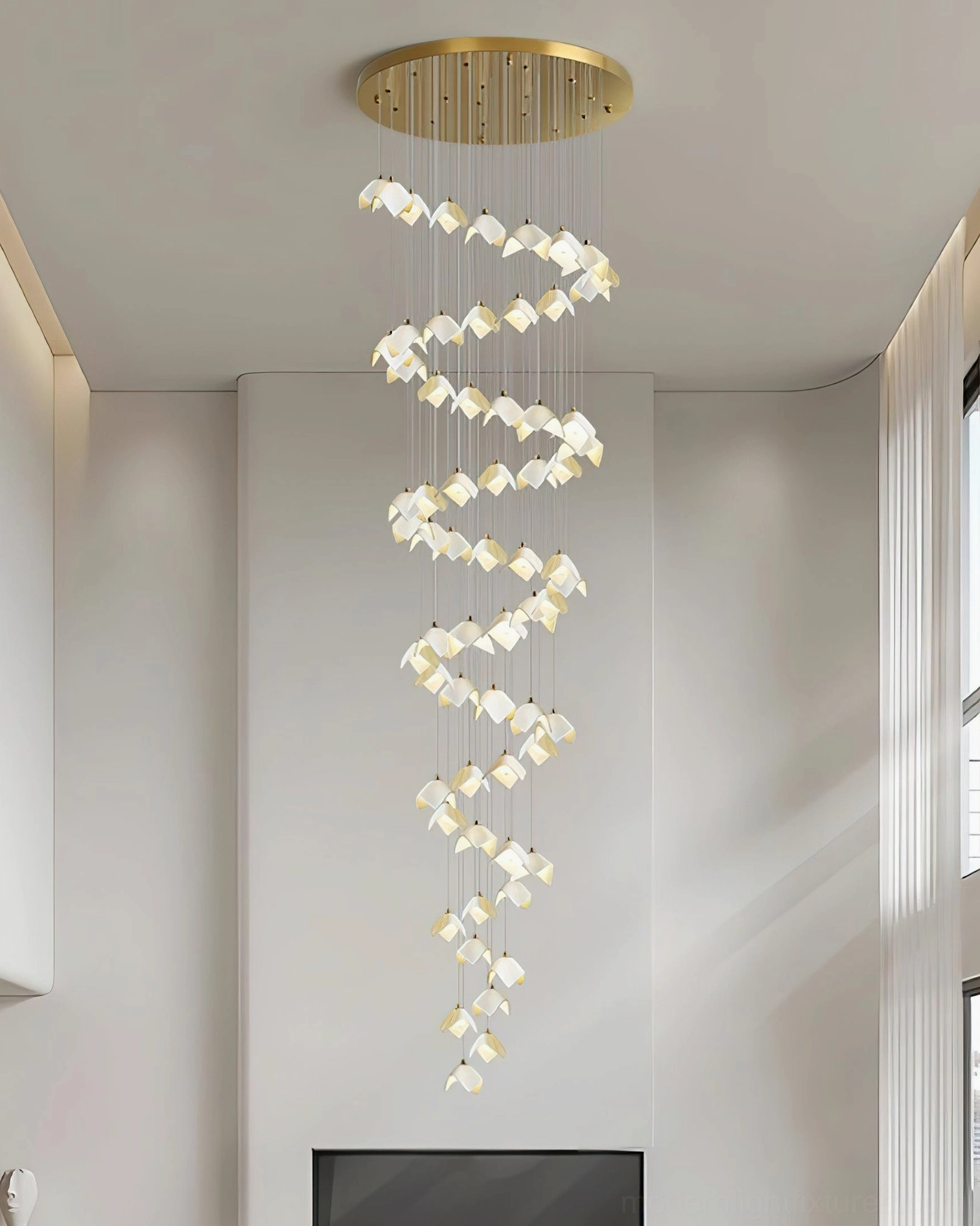 Cascading bloom chandelier providing ambient lighting in contemporary living space with sculptural presence