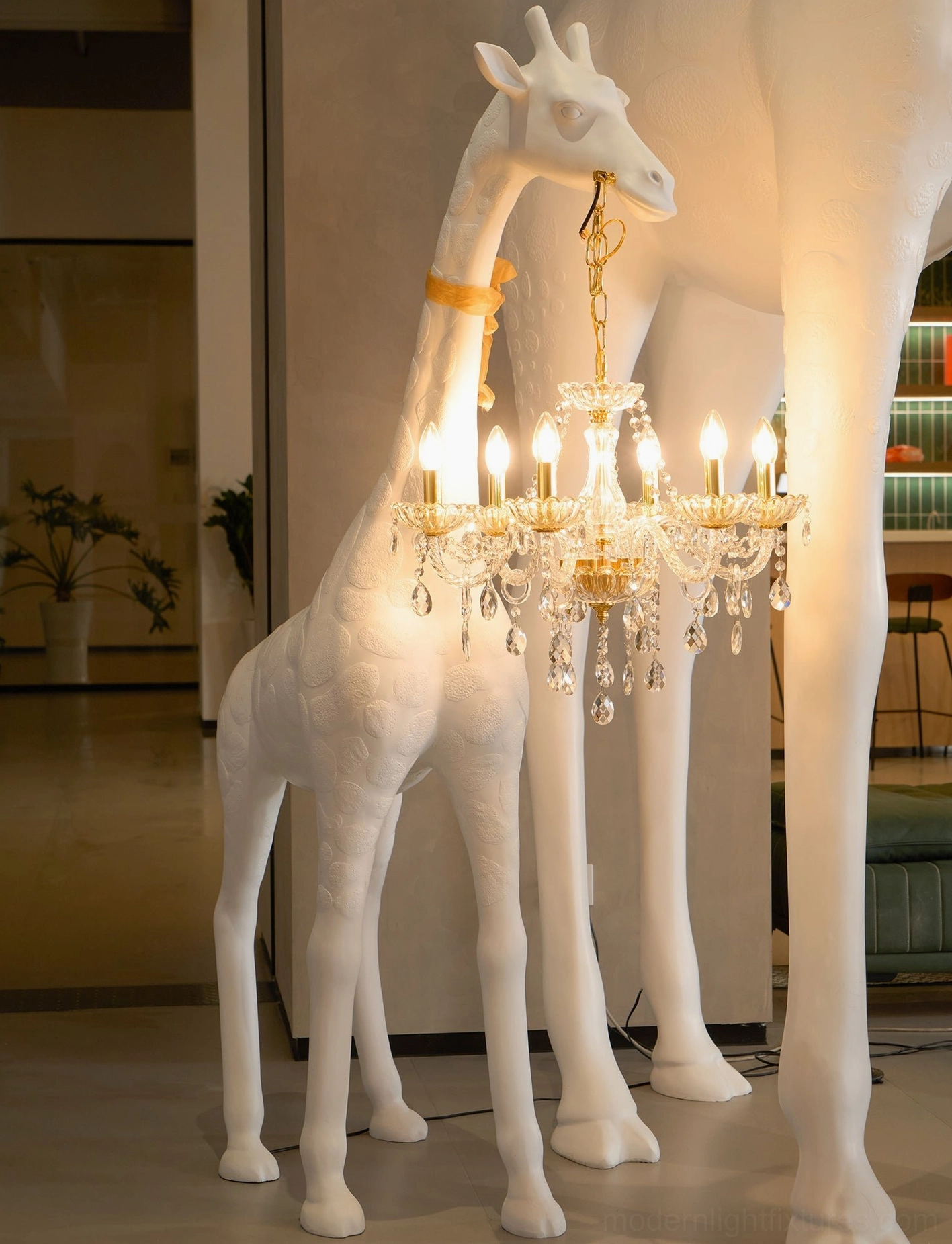 Contemporary giraffe floor lamp artistic lighting fixture showing sculptural resin body and crystal elements