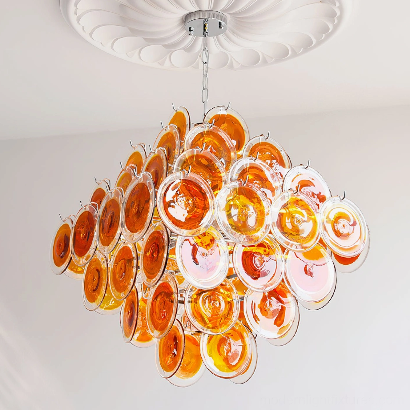 Contemporary glass disc chandelier ambient view demonstrating atmospheric lighting in modern home environment