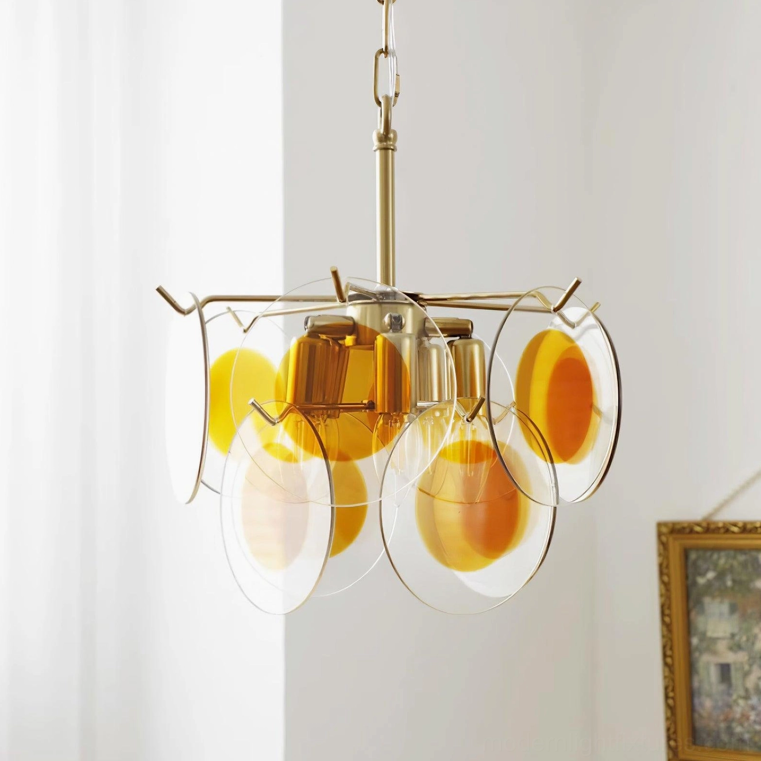 Brass gold glass disc chandelier contemporary dining lighting fixture interior design focal point