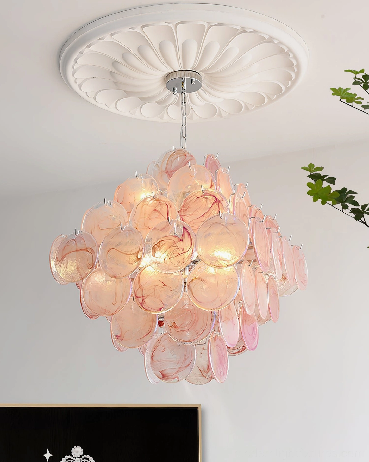 Contemporary glass disc chandelier restaurant dining interior elegant installation with warm illumination